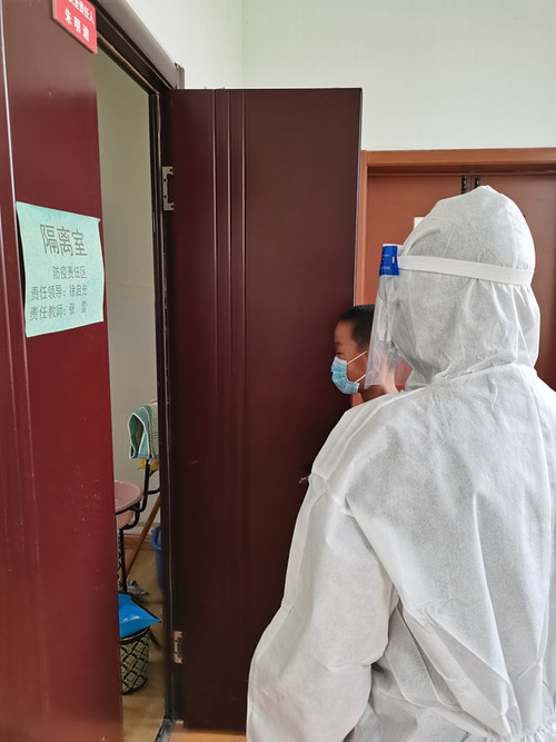 通榆县培智学校开展疫情防控应急演练 筑牢校园安全防疫城墙IMG_20210903_152200.jpg